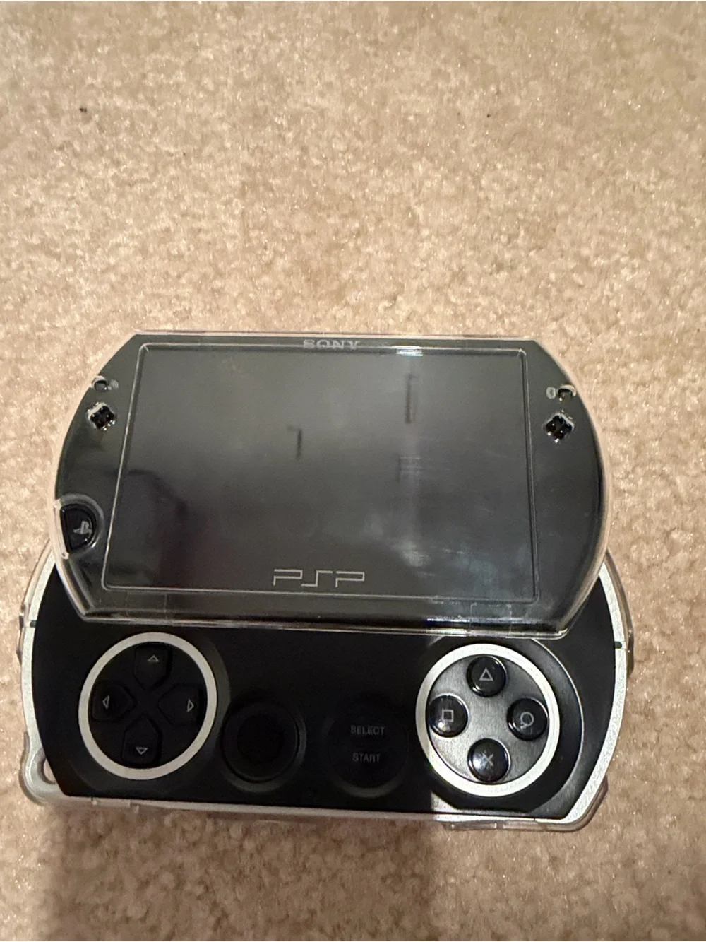 Sony PSP Go Portable Gaming System in Black and Purple